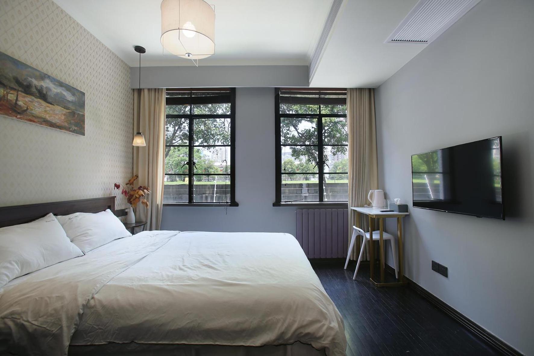 Shanghai Downtown Hills Boutique Guesthouse - Near Metro Line 7, Exit 3, Changping Road Xangai Quarto foto